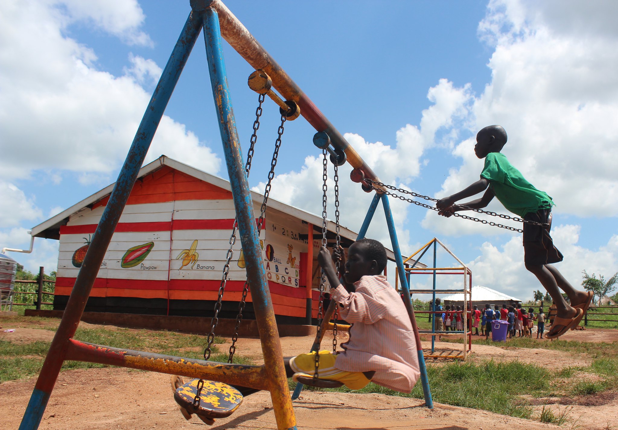 Children play on the playground of their preschool.
